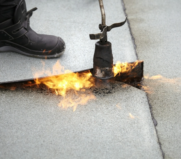 Naprawa dachów papowych